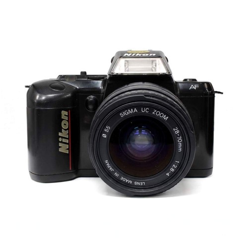 Nikon 401 sigma - +, af