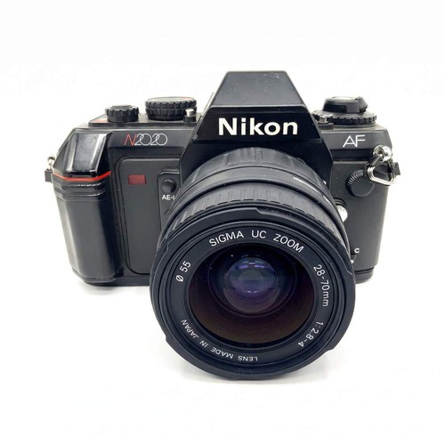 Nikon n2020 sigma zoom - uc, af